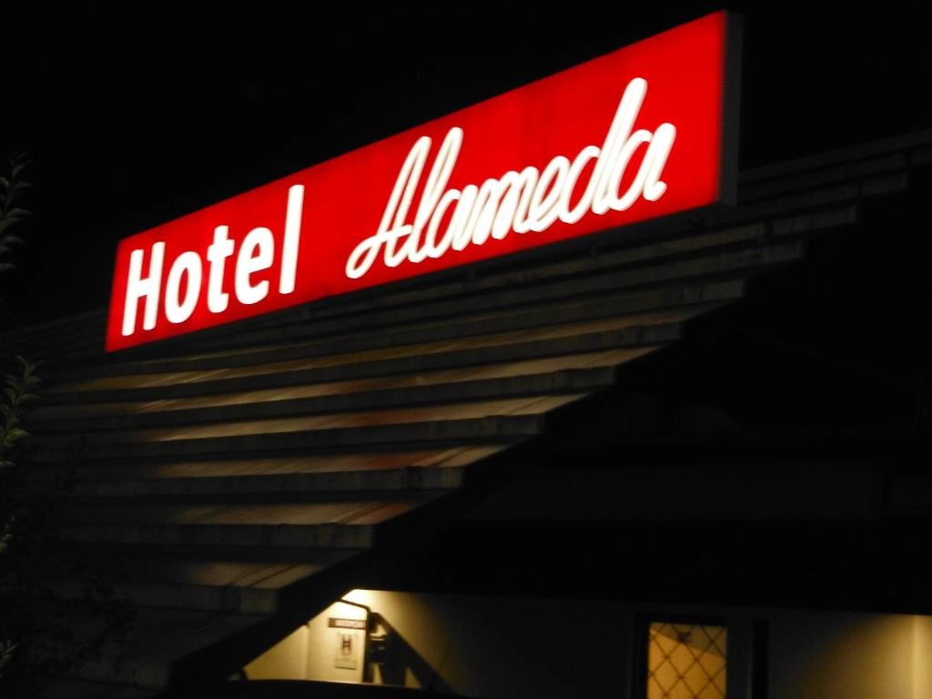 Hotel Alameda sign at night